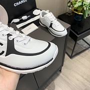 Chanel Women's Black and White Low Top Logo Sneaker - 2
