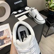 Chanel Women's Black and White Low Top Logo Sneaker - 6