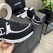 Chanel Women's Black Low Top Logo Sneaker - 6