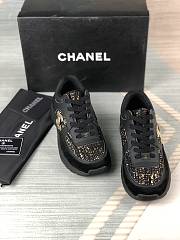 Chanel Low Top Trainer Black and Gold - 2