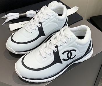 Chanel Women's Black and White Low Top Logo Sneaker