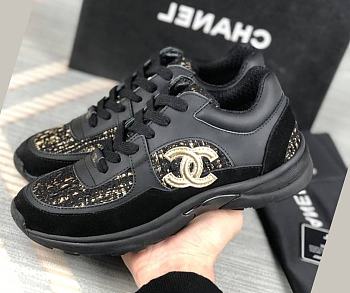 Chanel Low Top Trainer Black and Gold
