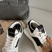 Jimmy Choo Black and White Sneaker - 6